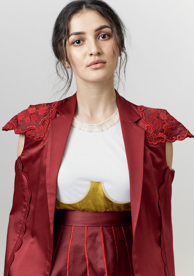Red embroidered jacket with scallop detailing