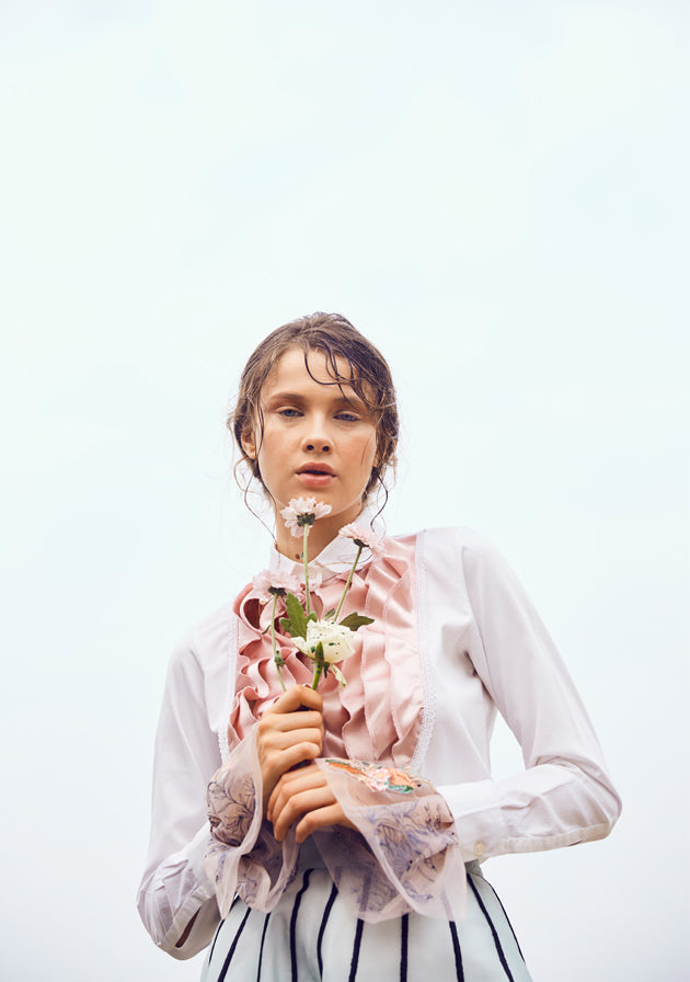 White ruffle shirt